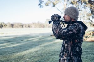 a guy using binocular